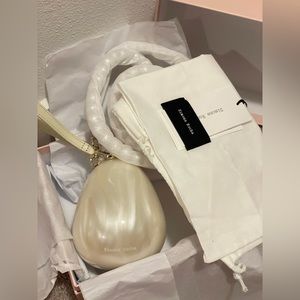 Micro Handheld Egg Bag in Beige Acrylic Glass